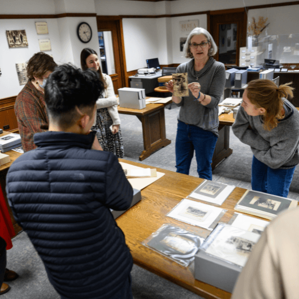 Students listen as Special Collections and Archives staff present artifacts and documents in the viewing room.